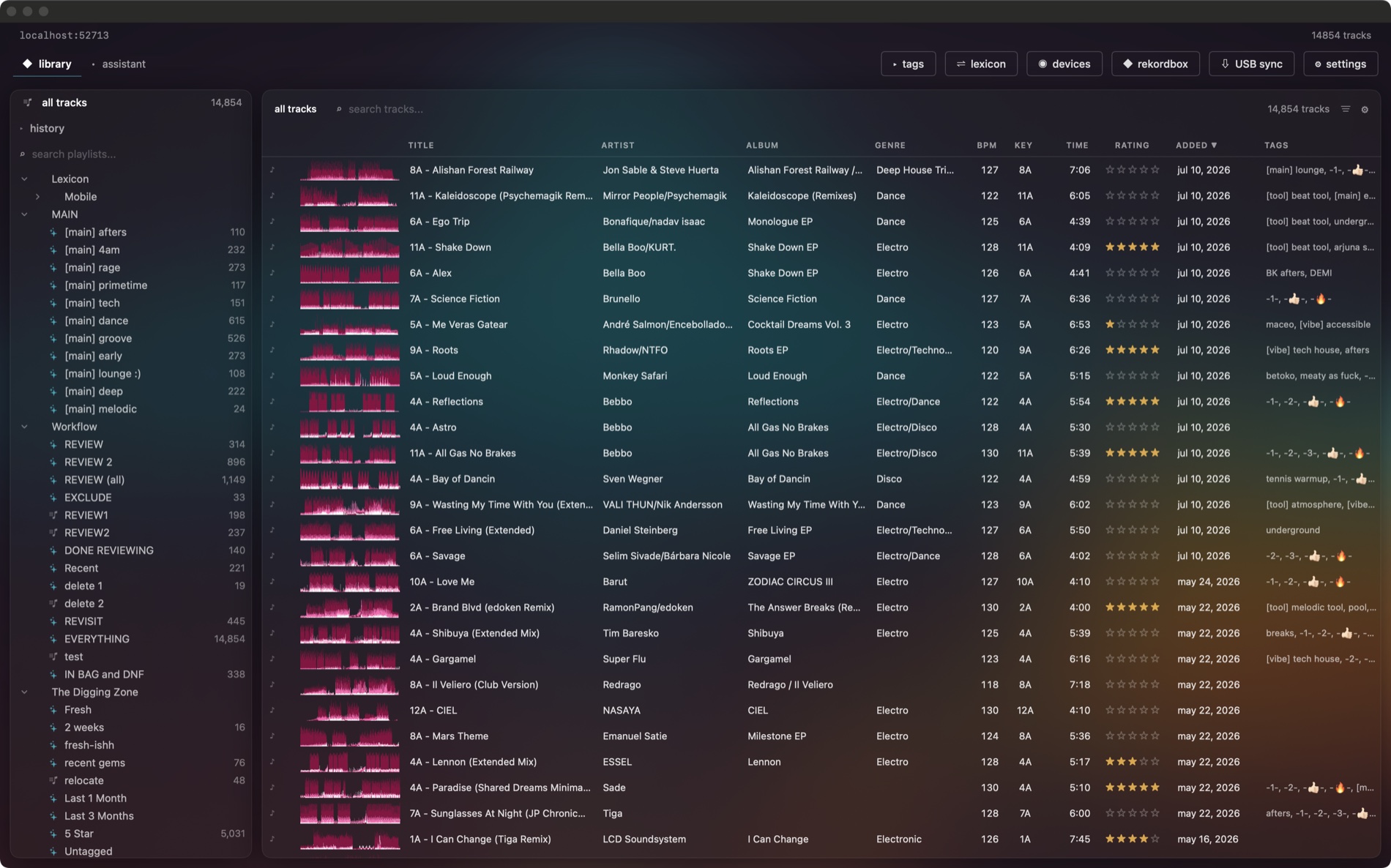 The Deeper library on macOS: track table with waveforms, tags, and smartlists